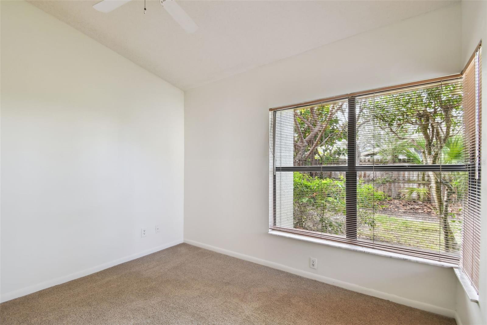 Rear bedroom with large windows