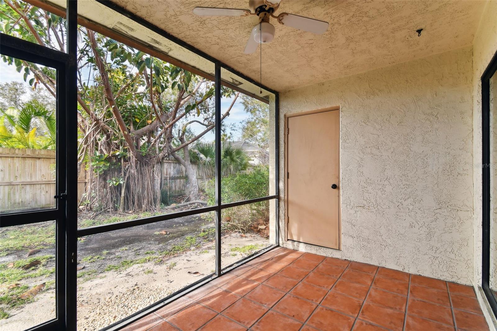 Covered porch has a storage closet