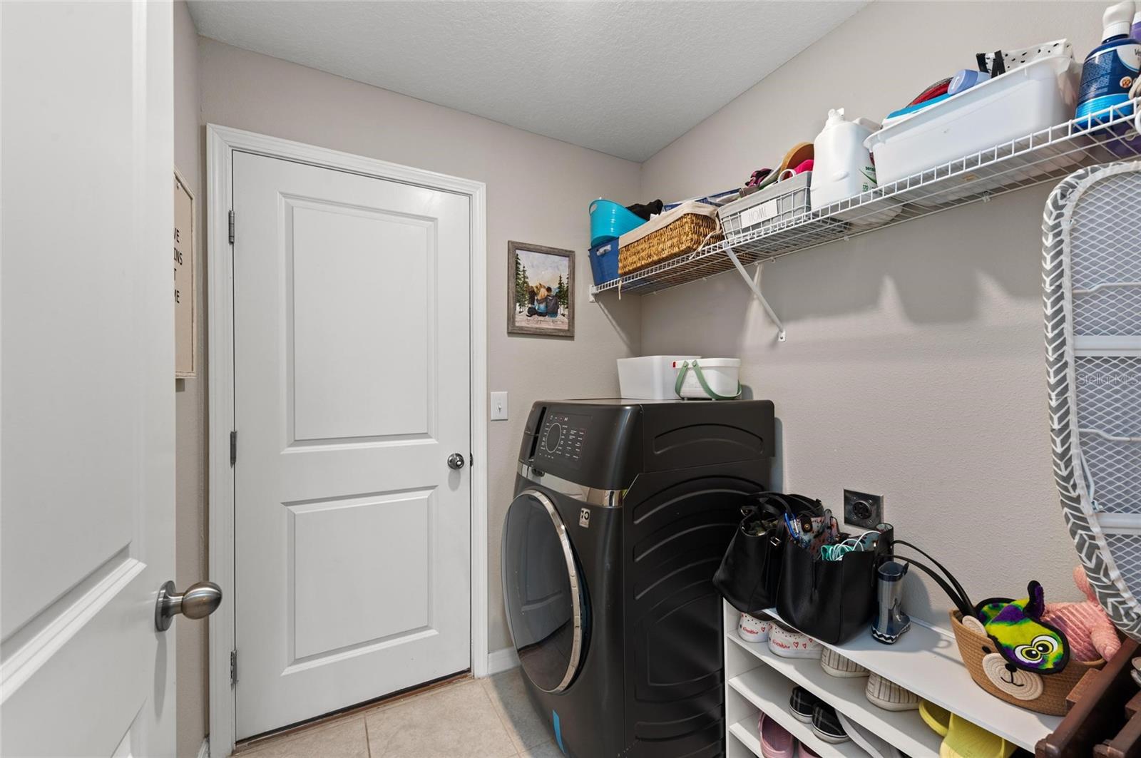 Laundry room off of kitchen.