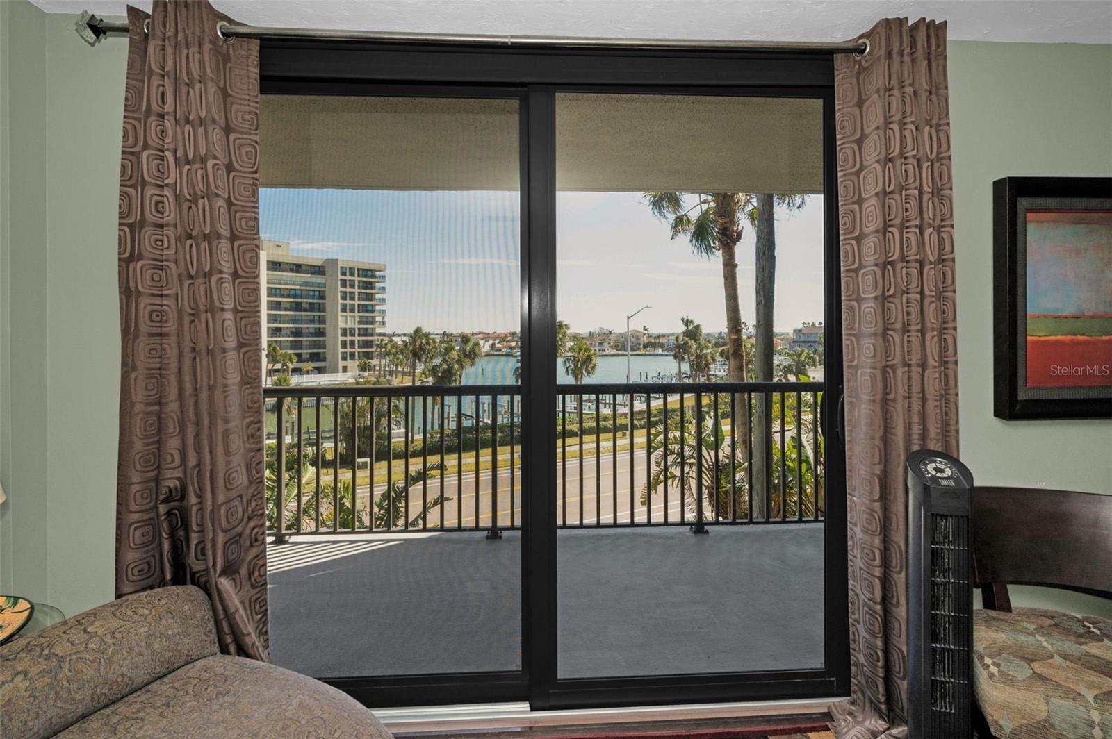 Sliders in the Primary Bedroom - leading to your private balcony!