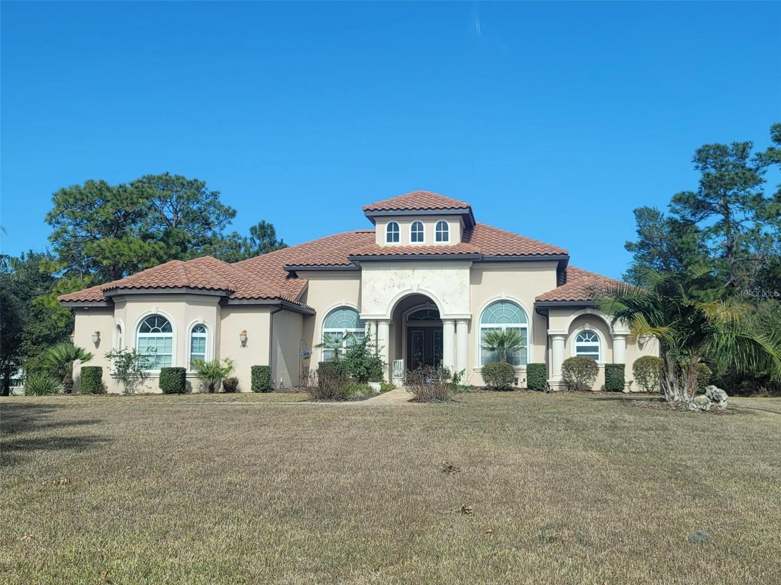 Front exterior on a private cul-de-sac lot