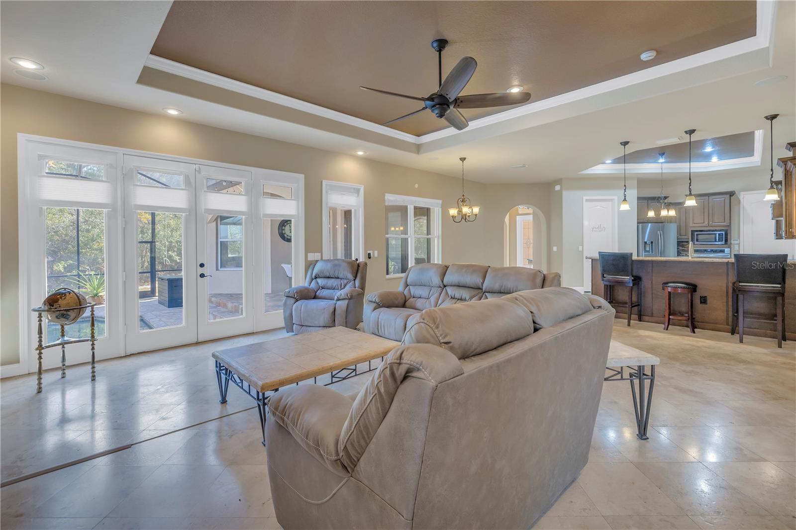 Bright windows and doors with lanai views and access