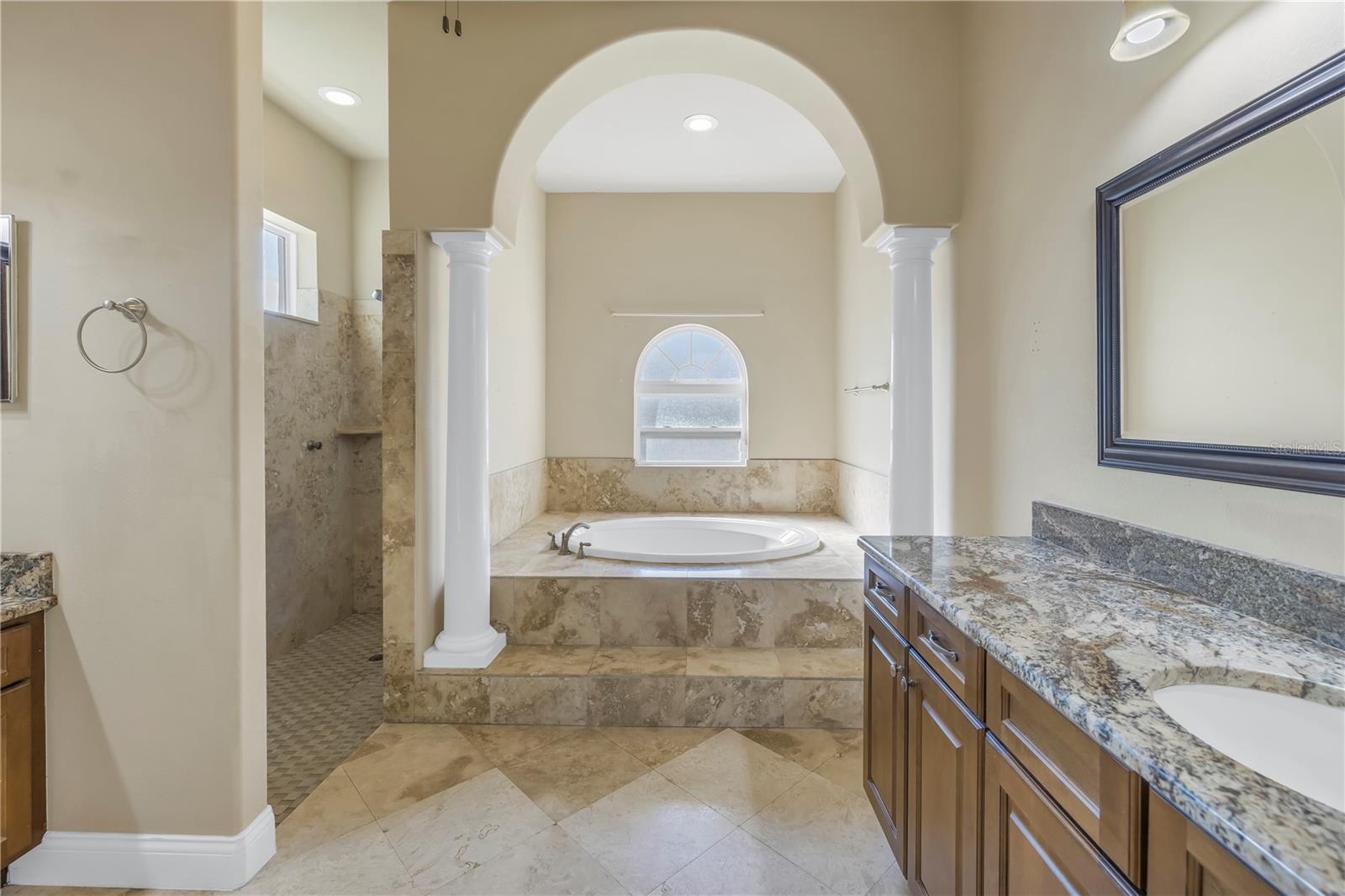 Dual sinks, soaking tub and walk-in shower