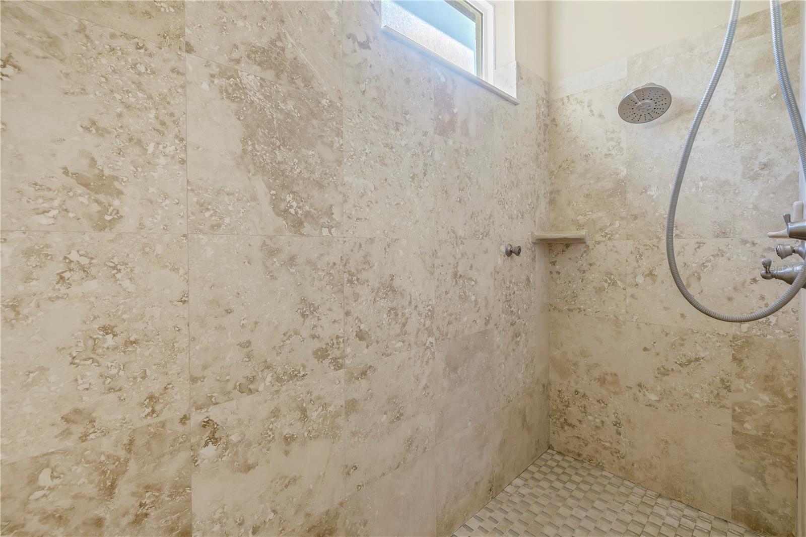 Tile shower with handheld