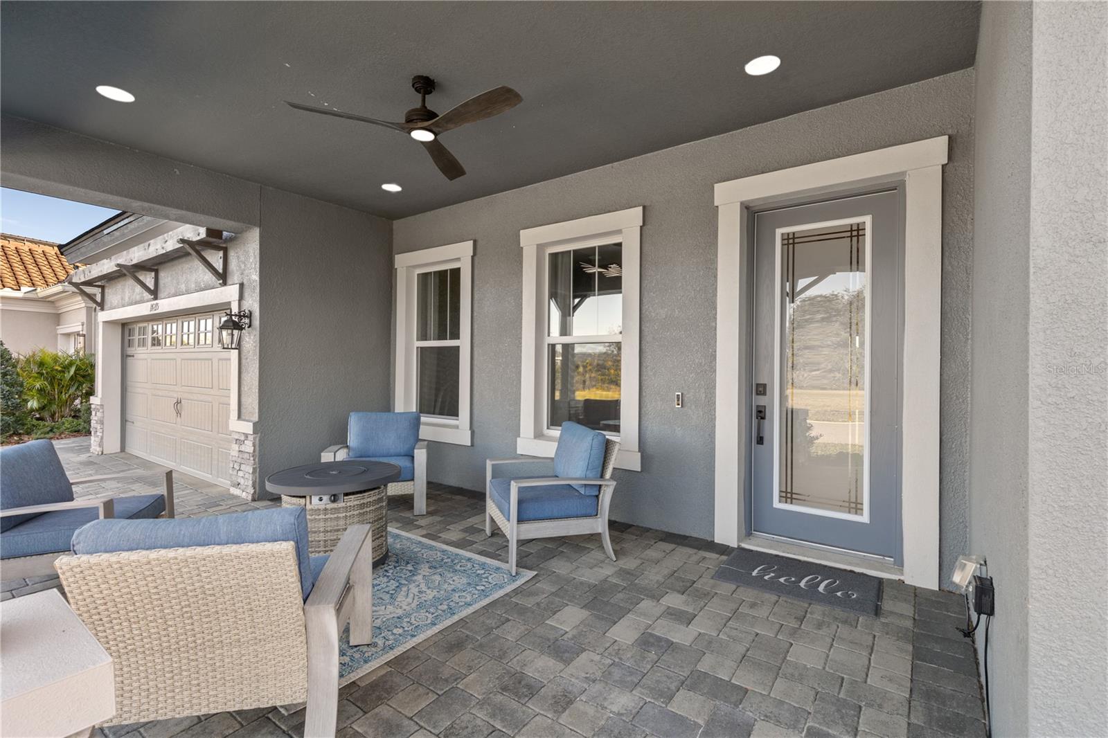 Cozy, covered porch and 8' glass entry door welcome you home!