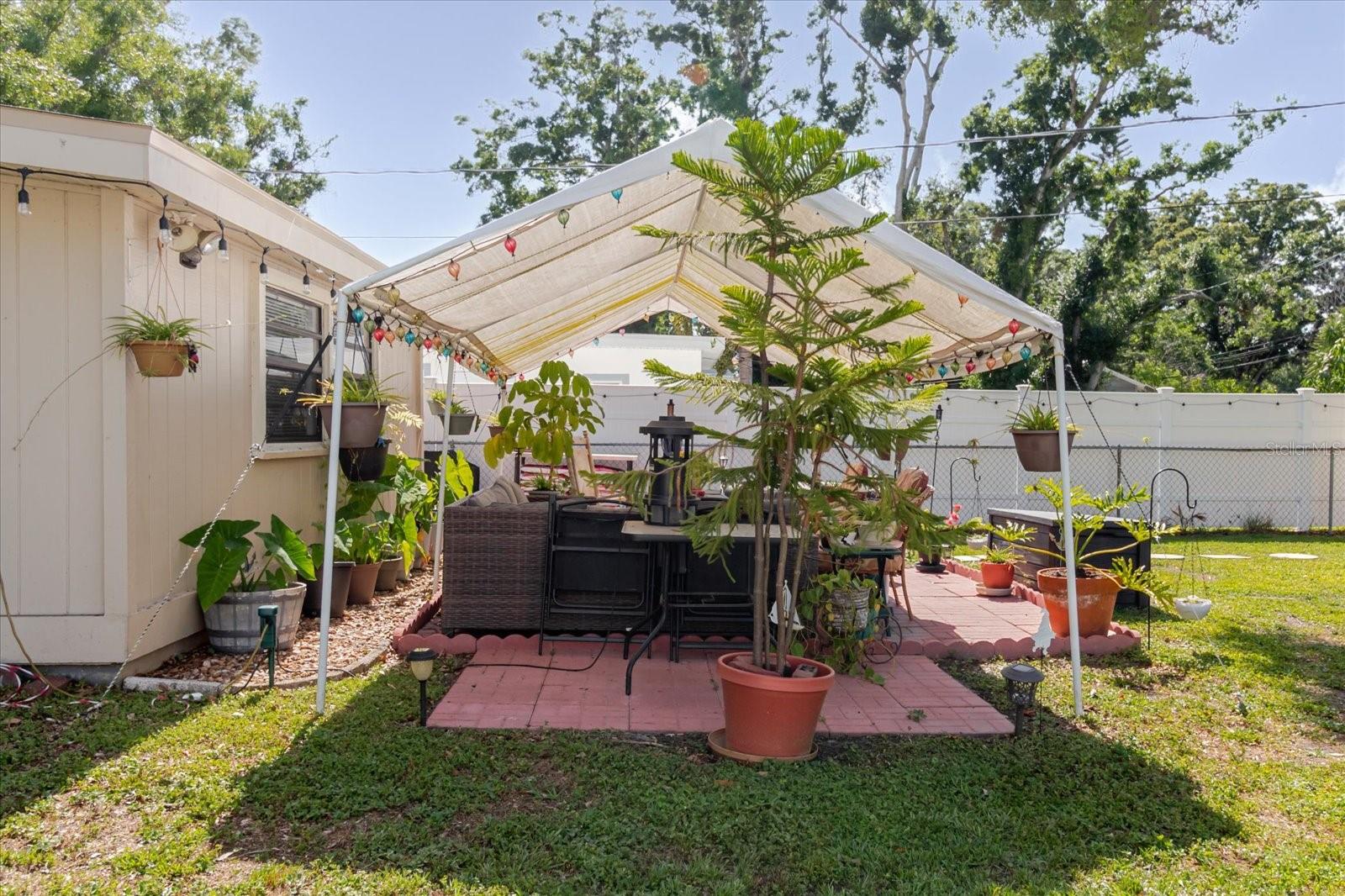 Shady Oasis For Al Fresco Dining In A Quiet Neighborhood
