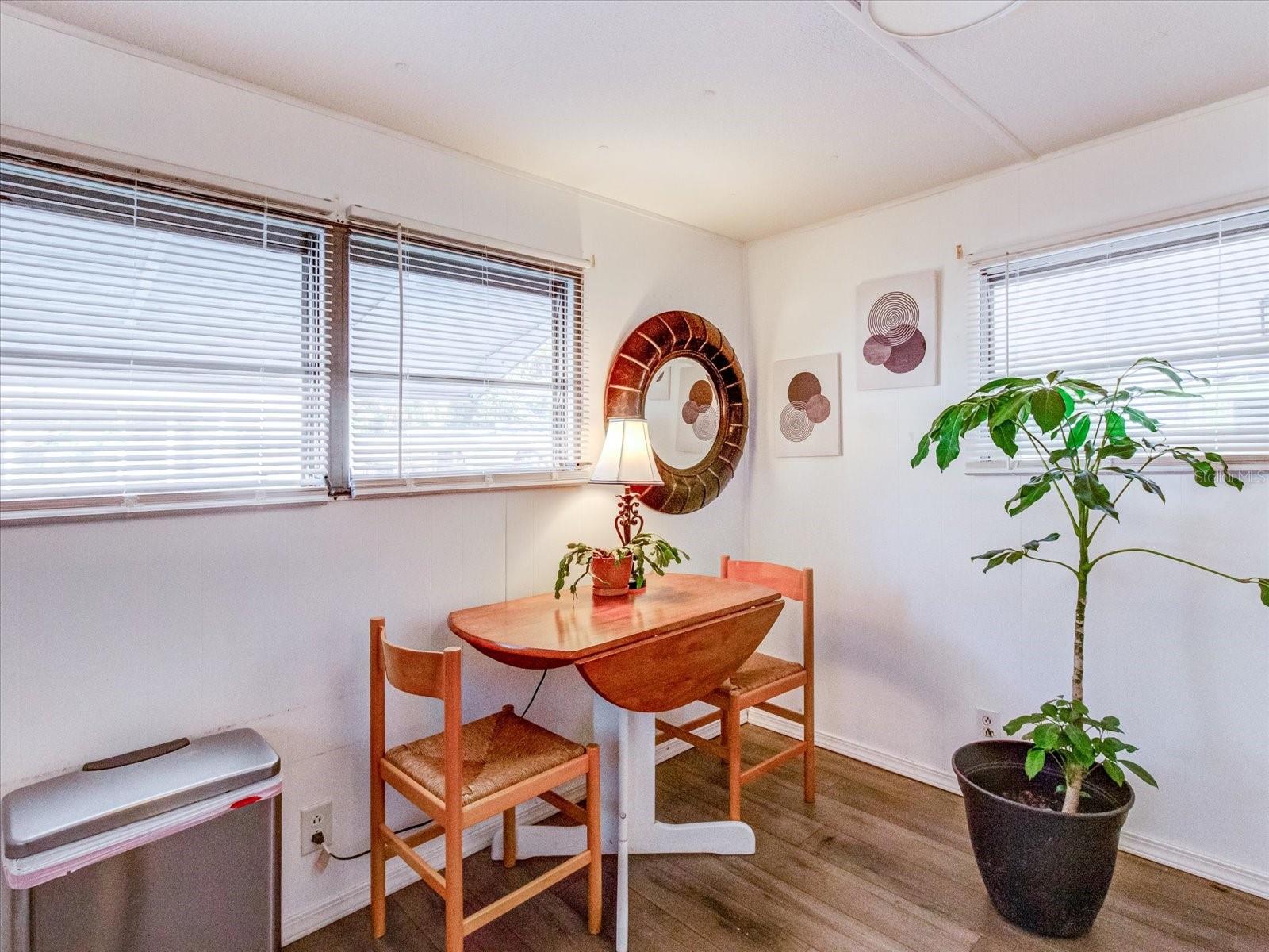 Updated Kitchen With Luxury Vinyl Flooring and Breakfast Area