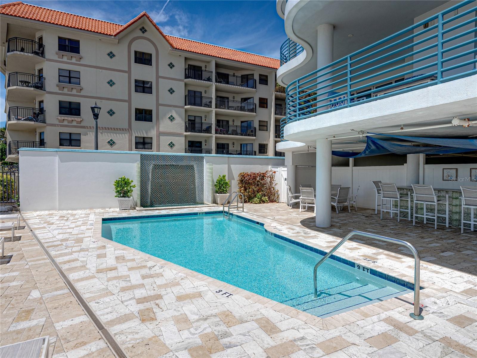 The beachfront pool area is perfect for entertaining, or just enjoying a beautiful beach day!