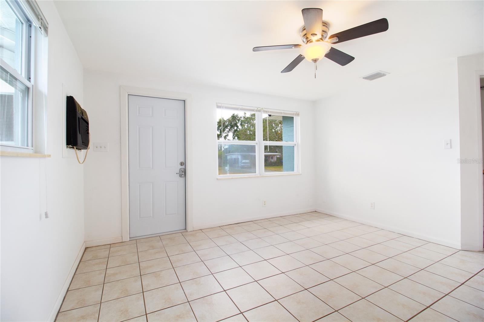 Living Room with tile flooring