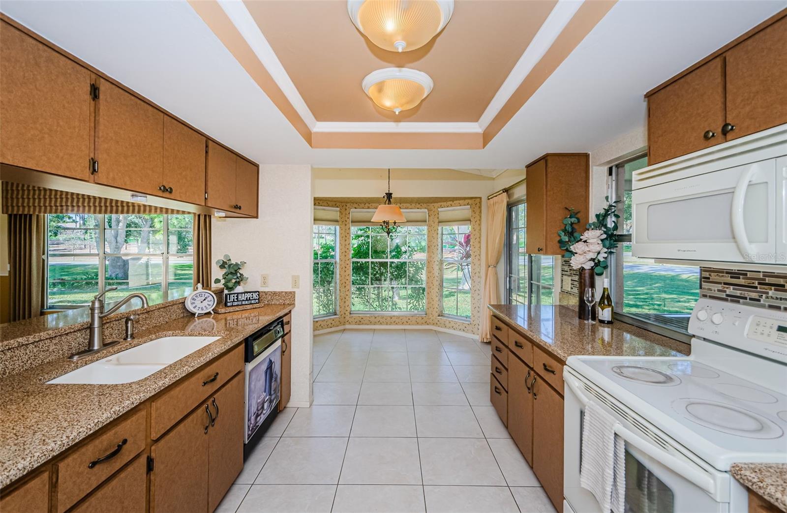 Kitchen Toward Breakfast nook w/ golf course views