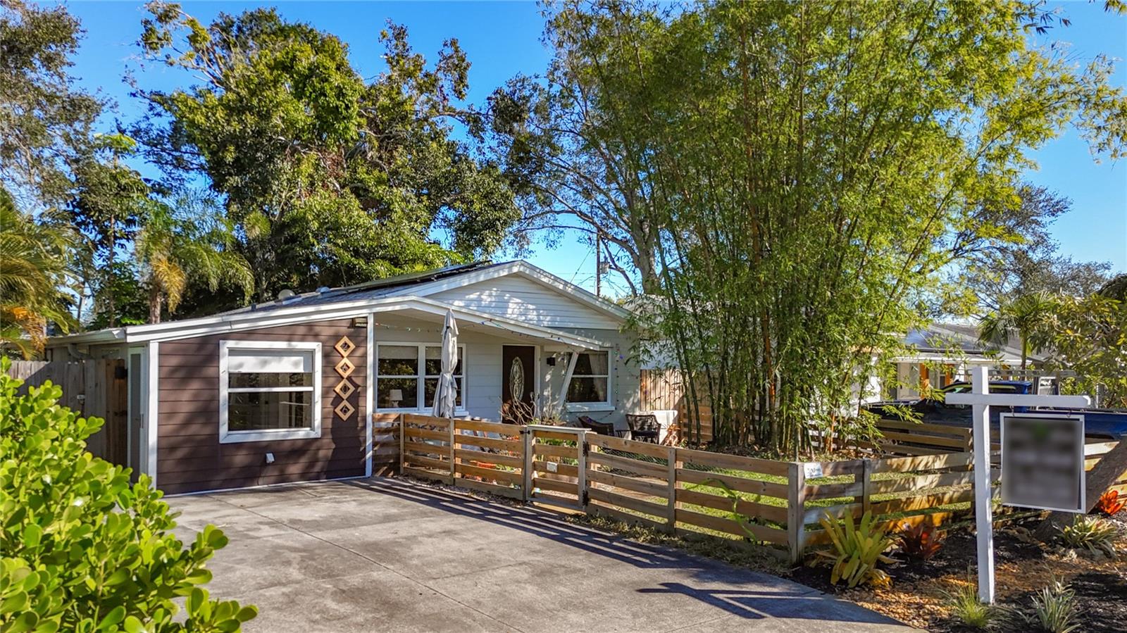 Fenced Front Yard and driveway