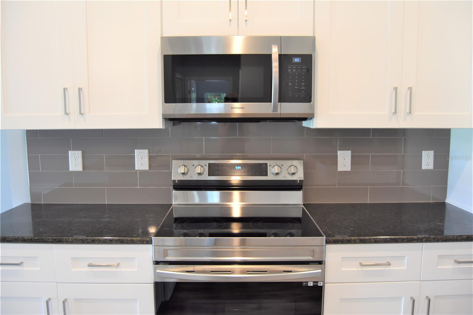 Beautiful solid wood cabinets and granite countertops.