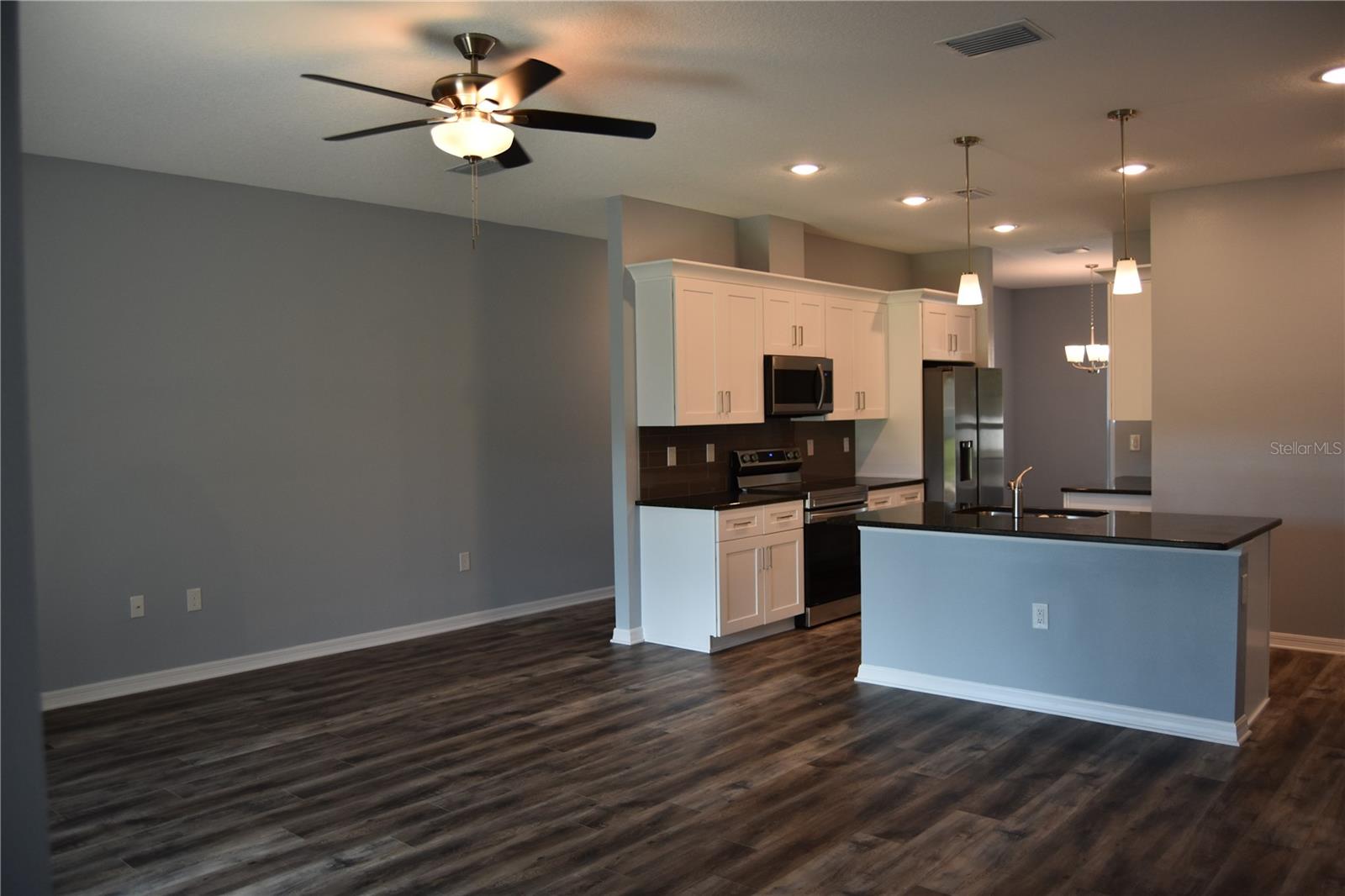 Open concept floor plan. Recessed lighting to brighten the space