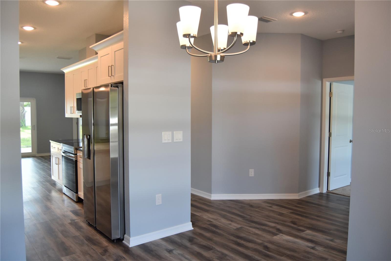 View from the dining room to the hall way.