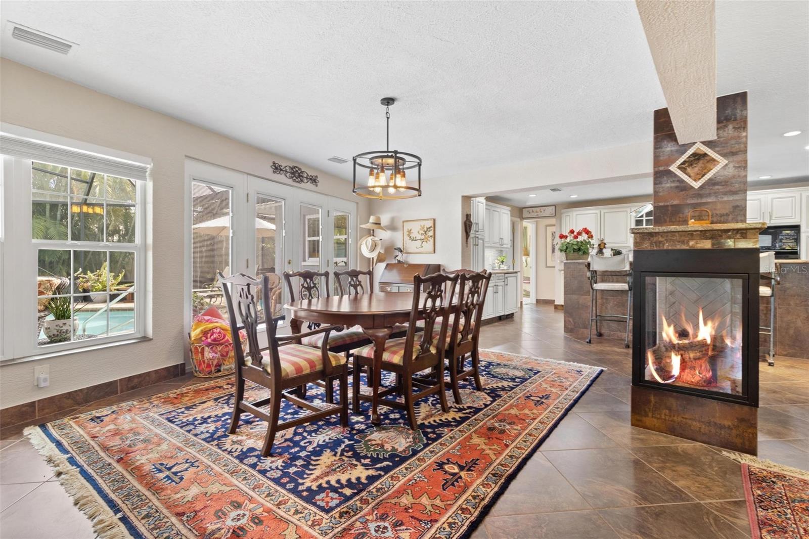 The central gas fireplace adds warmth and charm.