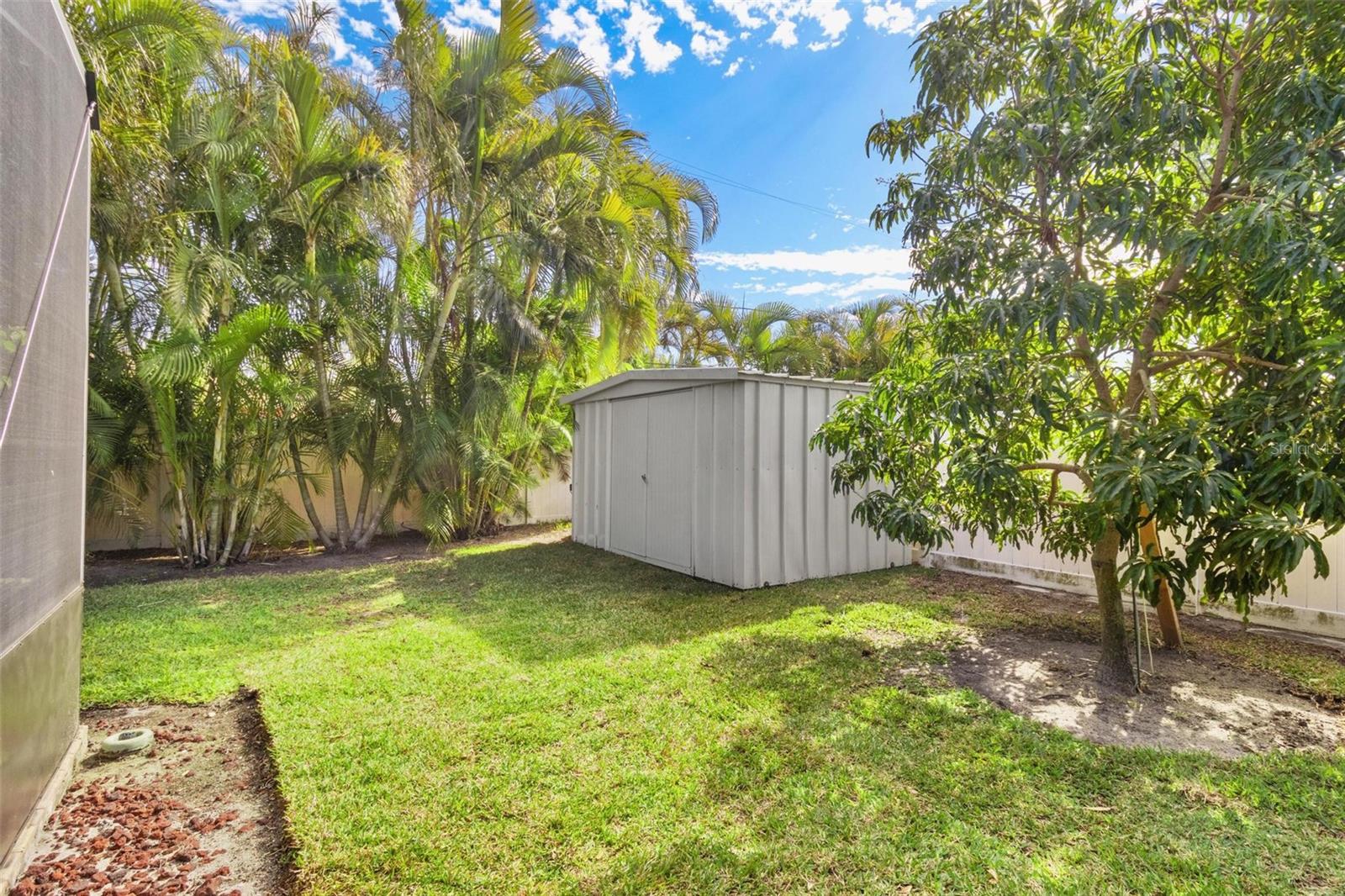 There's a 96 sq ft utility shed with double doors.