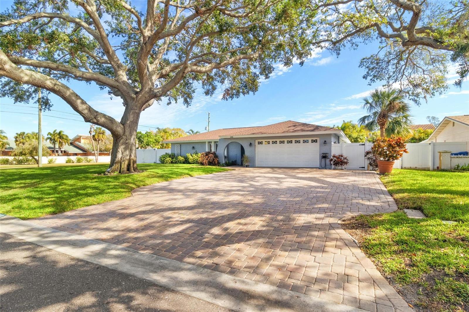 A 26' wide paver driveway gives lots of parking.