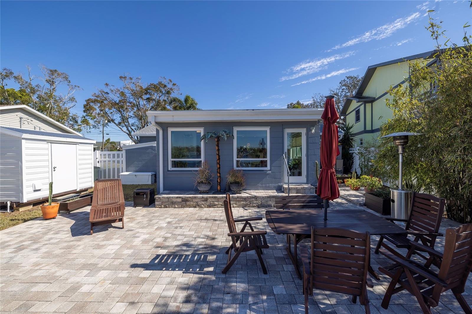 Live life outdoors! Pavered patio to enjoy the day