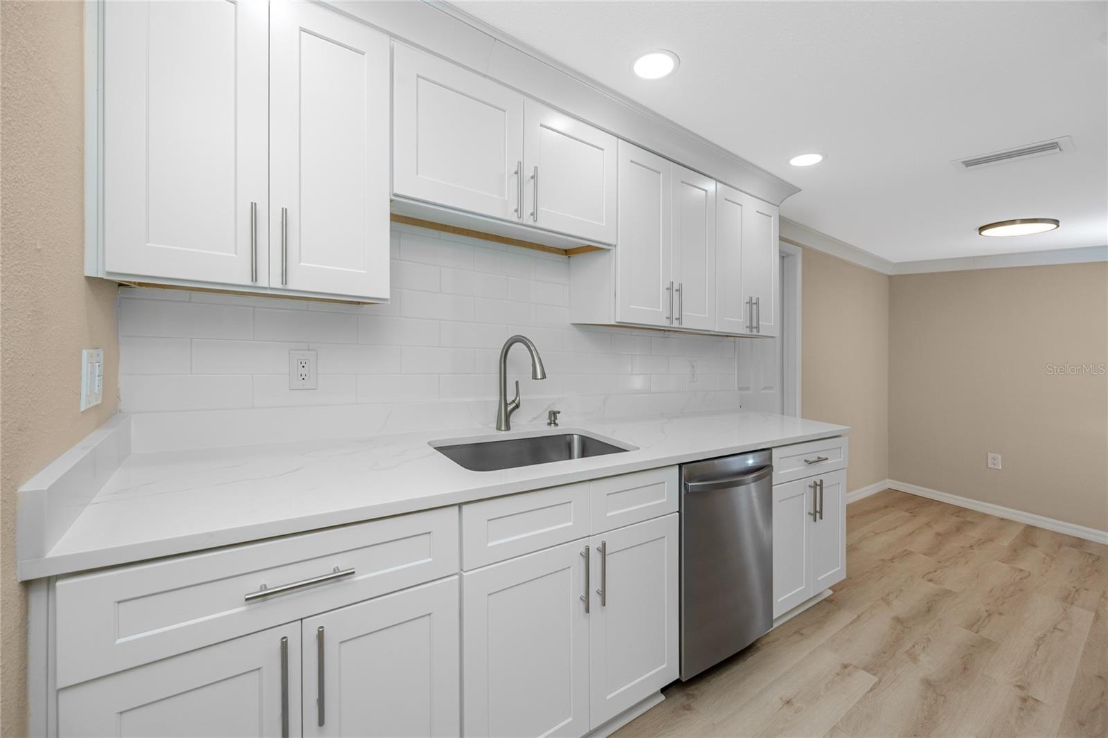 Kitchen with shaker wood cabinets