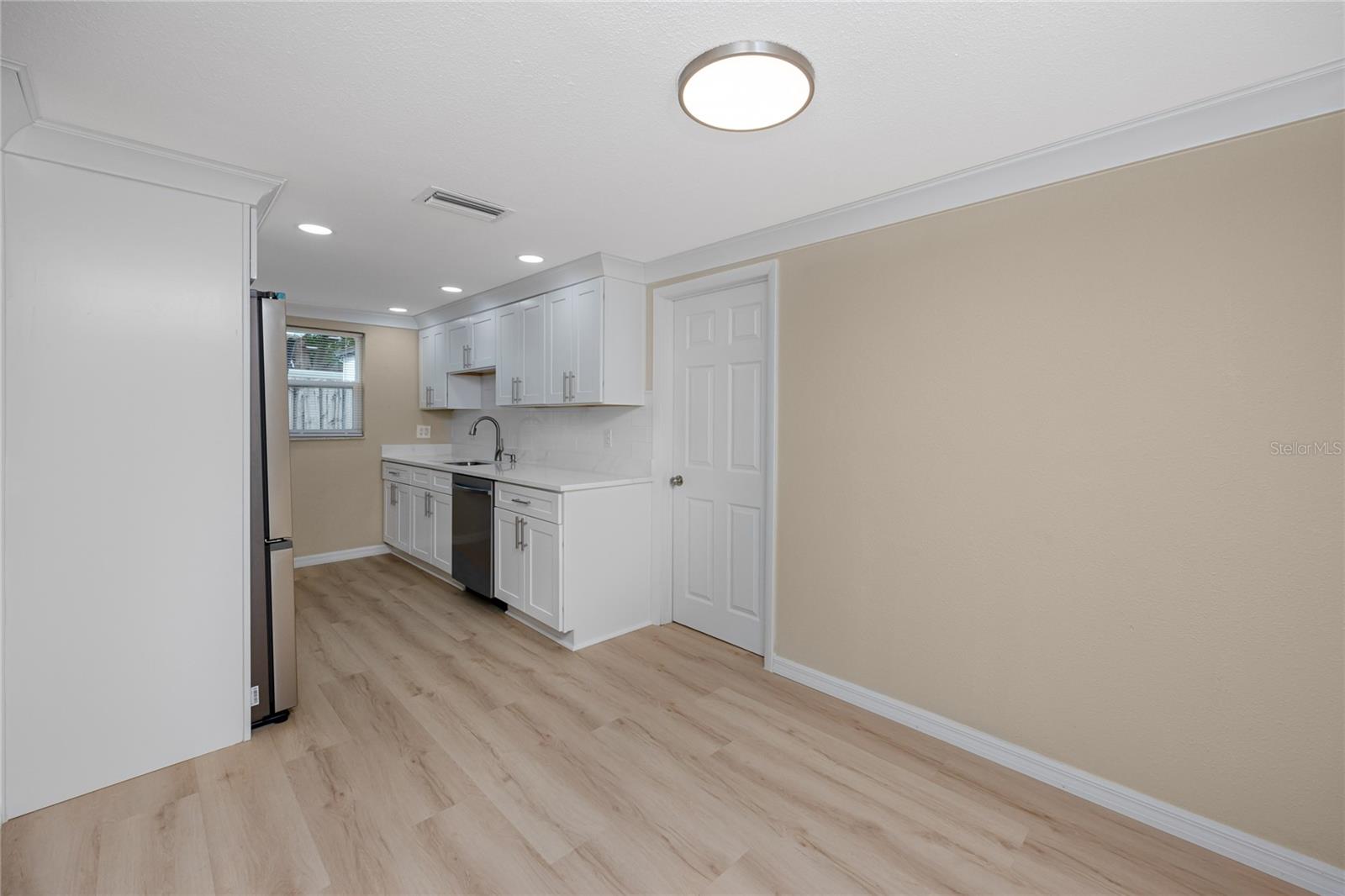 Kitchen with shaker wood cabinets