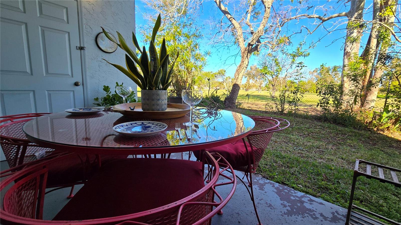 Another view of the rear patio.  Door to the left is the units private outdoors storage space.