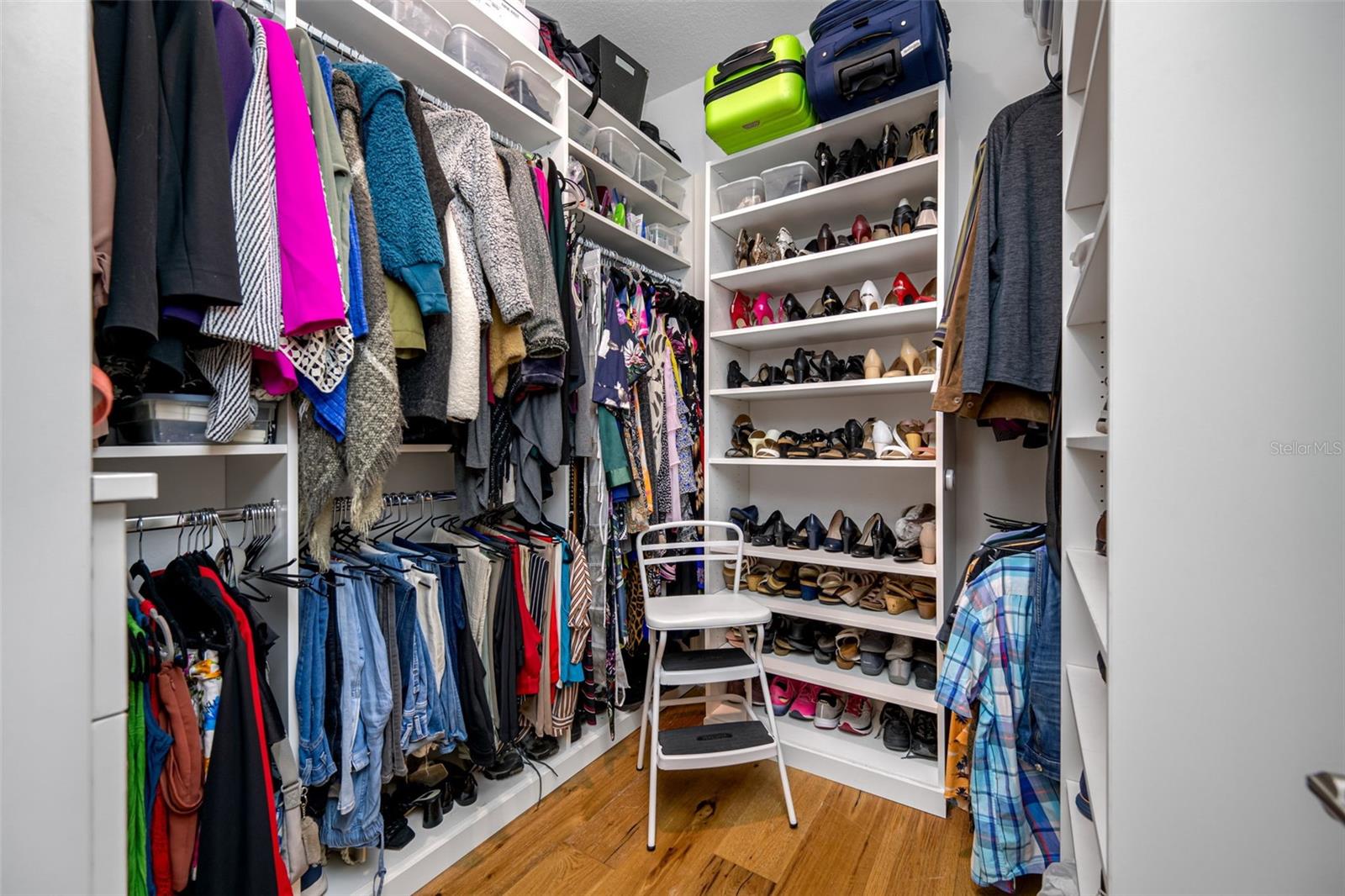 Primary Walk-in Closet with custom closet system