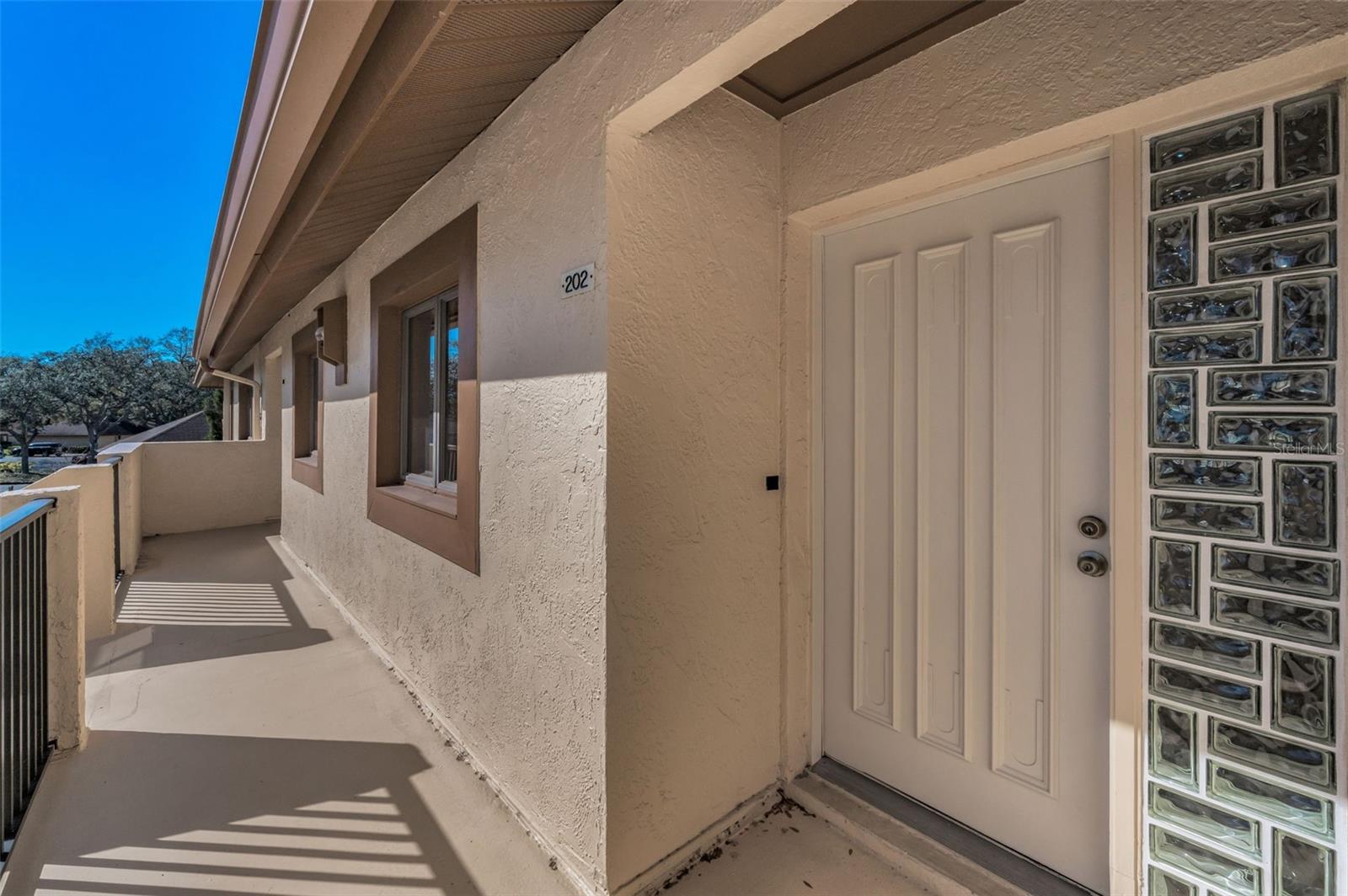 The front door to your home, 202. Only two units upstairs.