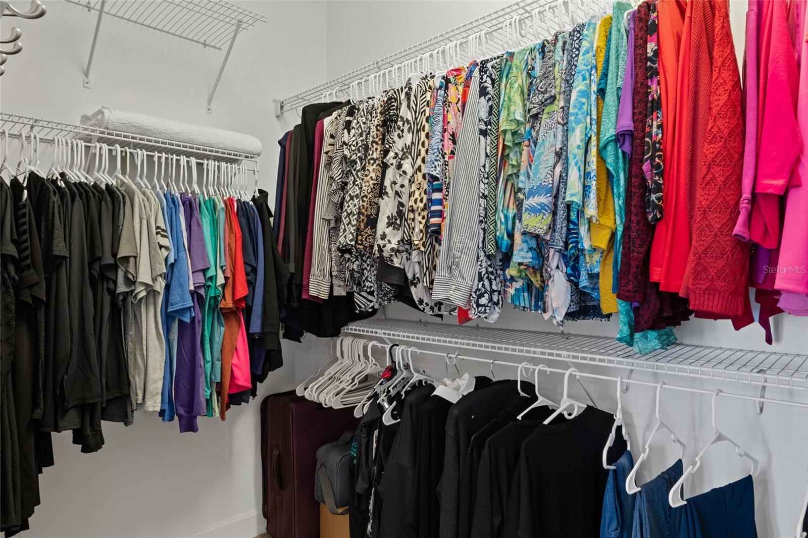 Master closet with plenty of storage options