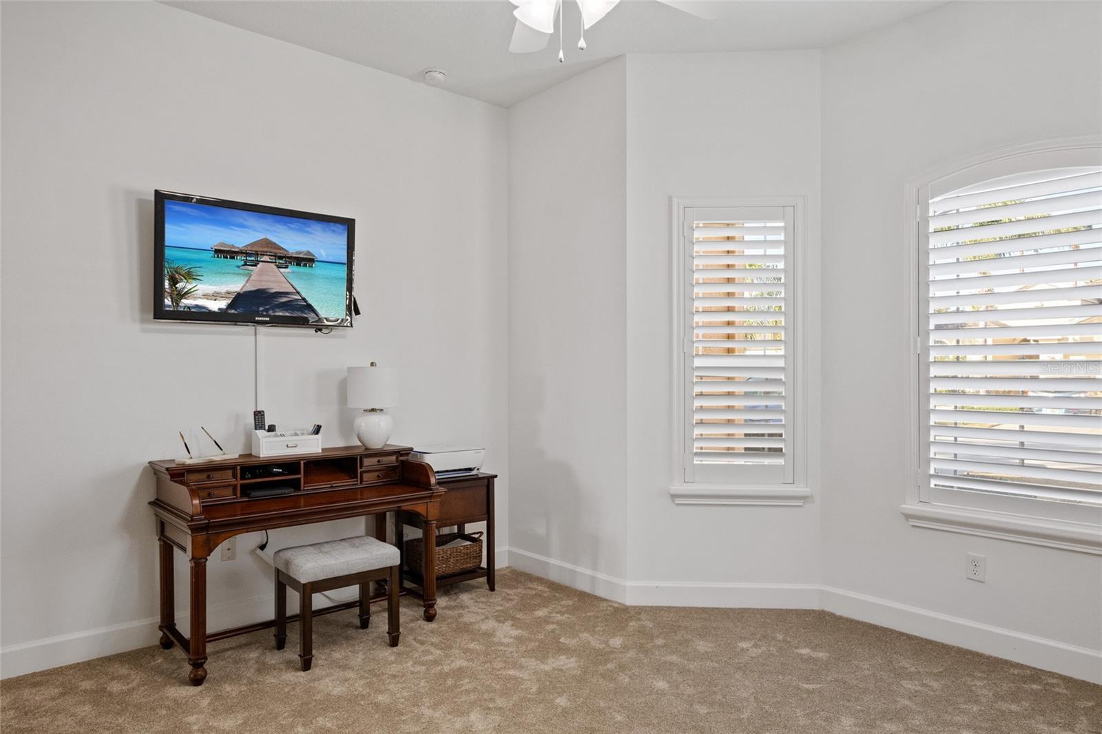 Freshly painted front bedroom 3 is large enough for a queen size bed and dressers if you don't need an office.