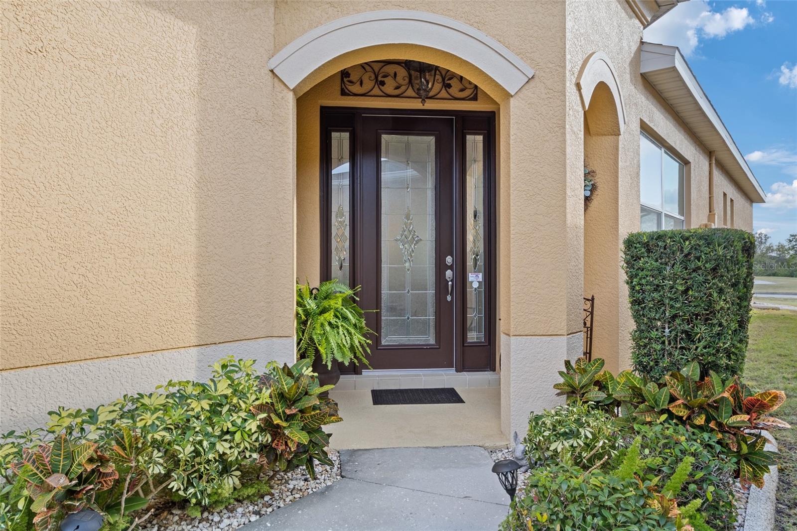 Covered Entry with Lead Glass Front Door that withstands 160 mph wind