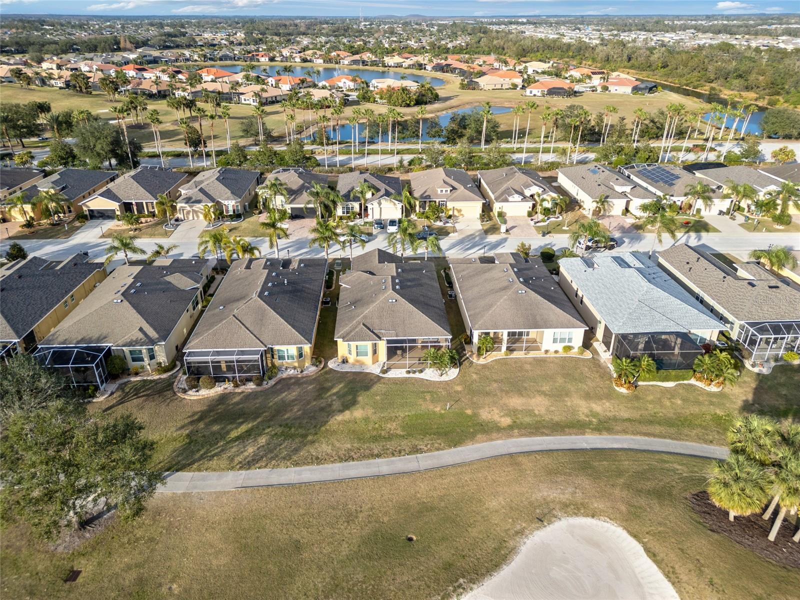 View from the 7th hole to your lanai and Siena Vista Pl neighbors