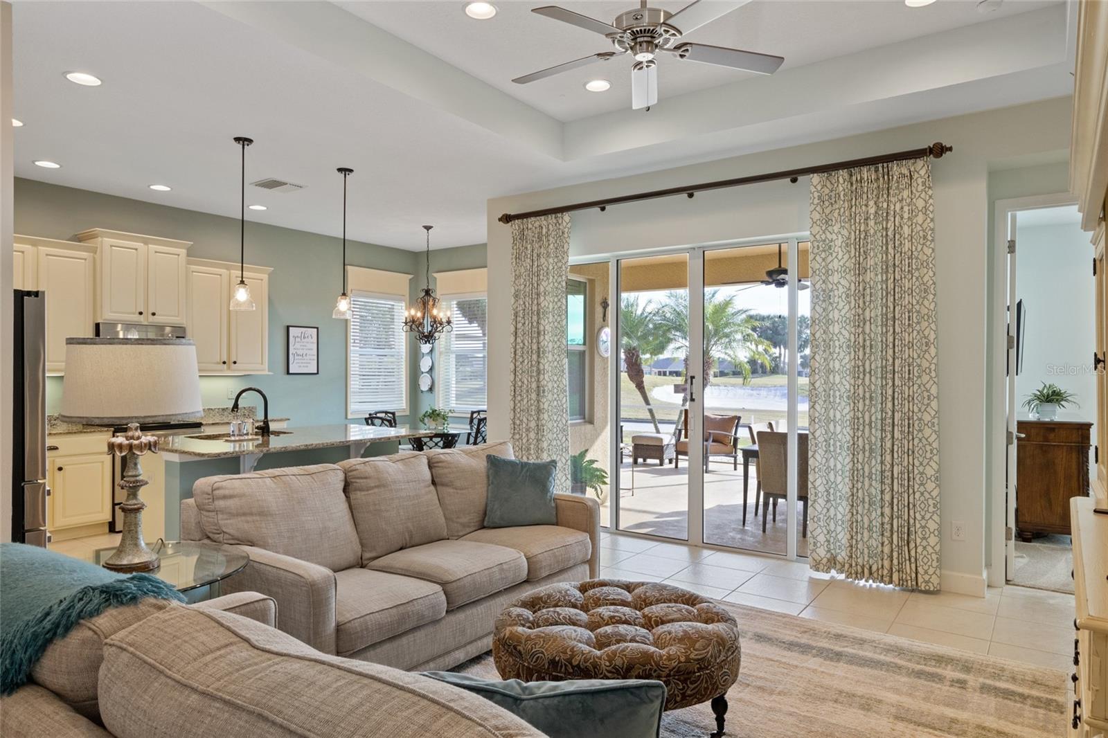 Sight line to the golf course from the front door thru the open concept living and kitchen area