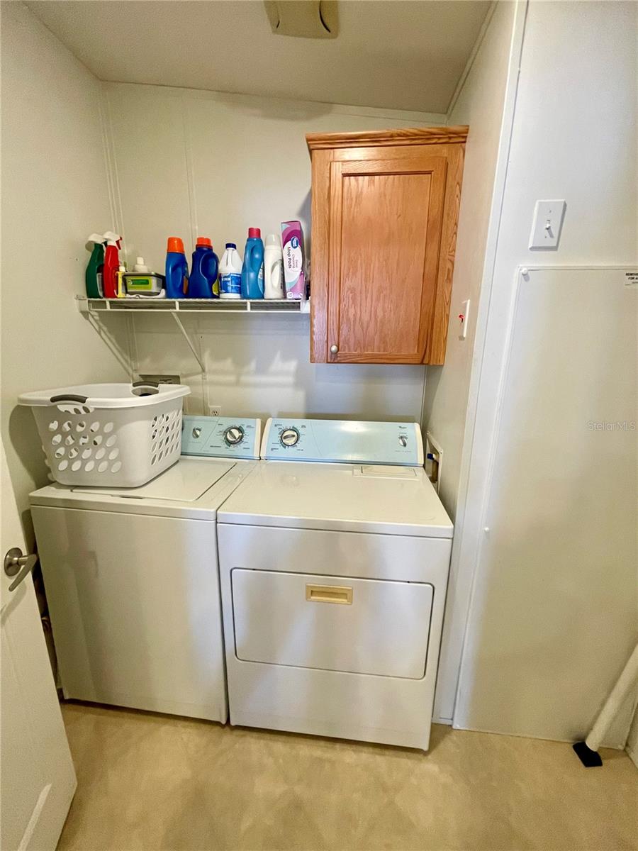 Laundry room - to the right is the door to the Florida room and shed.