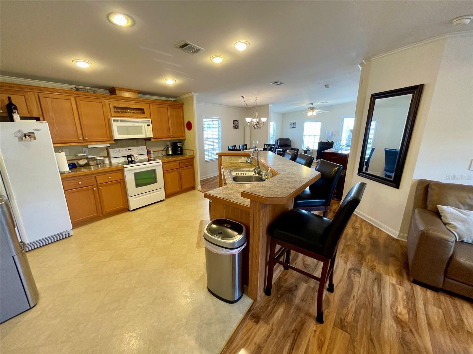 Looking back into the kitchen, and the bar area, plenty of entertaining space here.