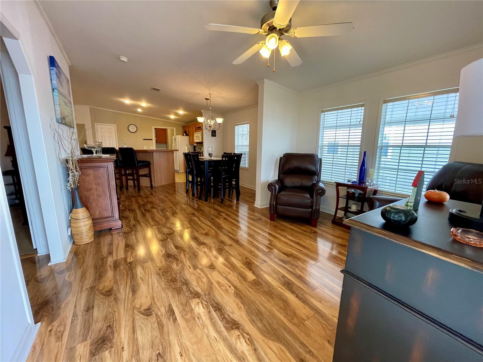 Walking in the front door... beautiful laminate floors in the living spaces. Cathedral ceilings