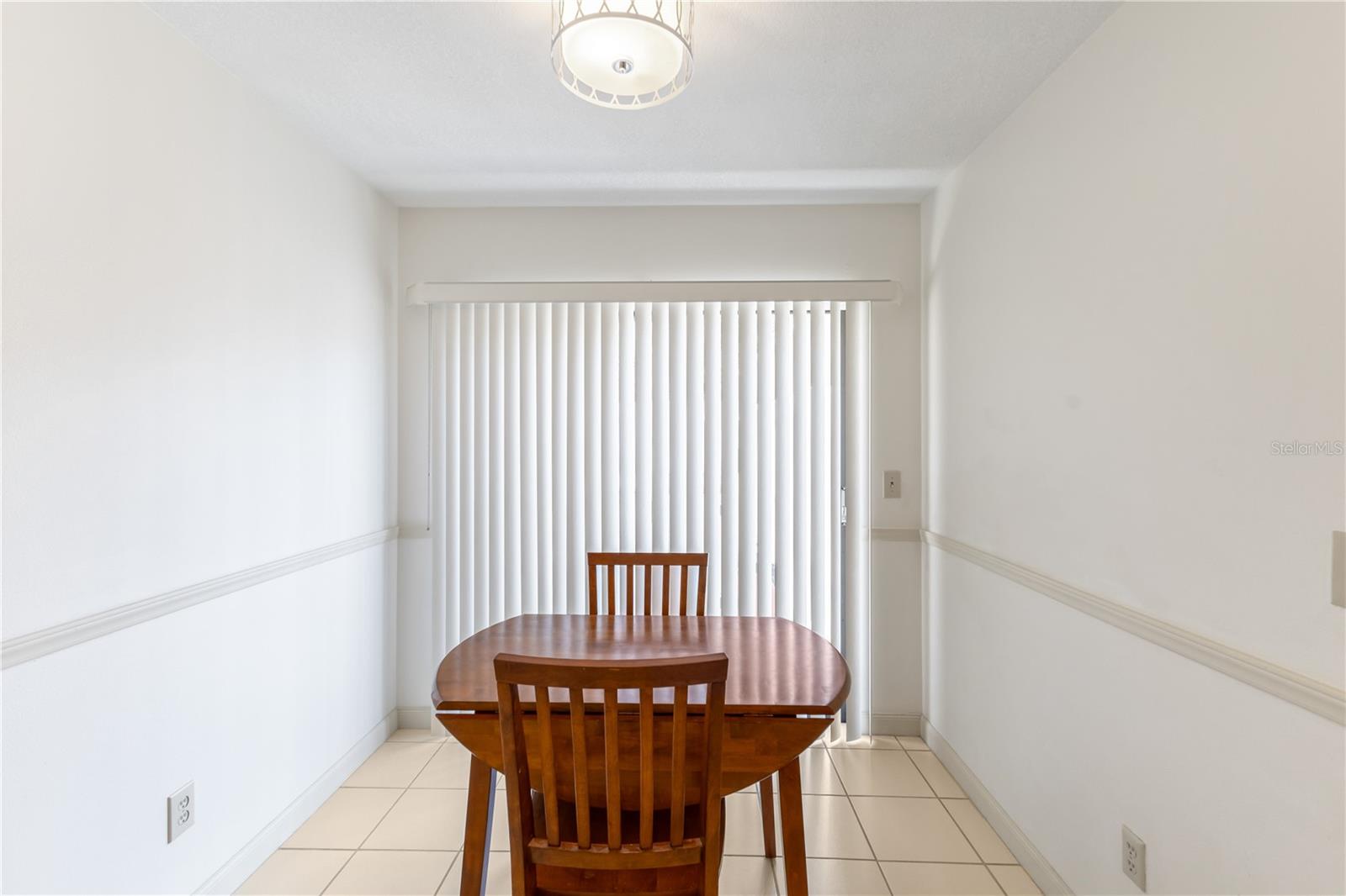 A cozy breakfast nook in the kitchen is perfect for morning coffee and casual meals.