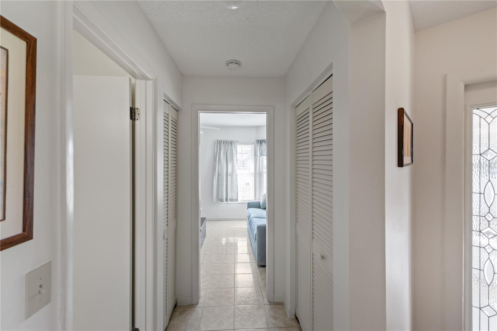 Hallway with storage closets