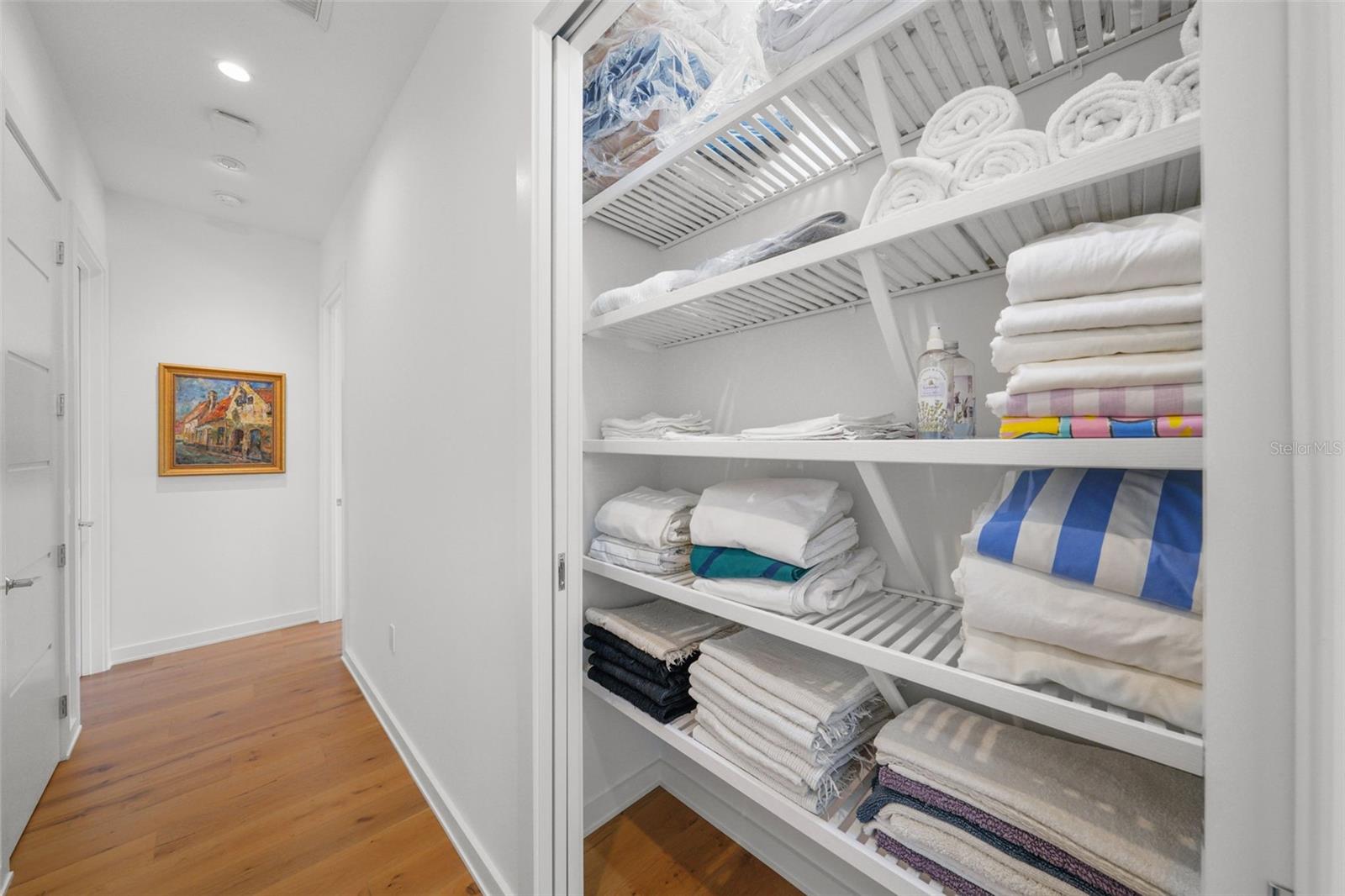 Large linen closet in upstairs hallway