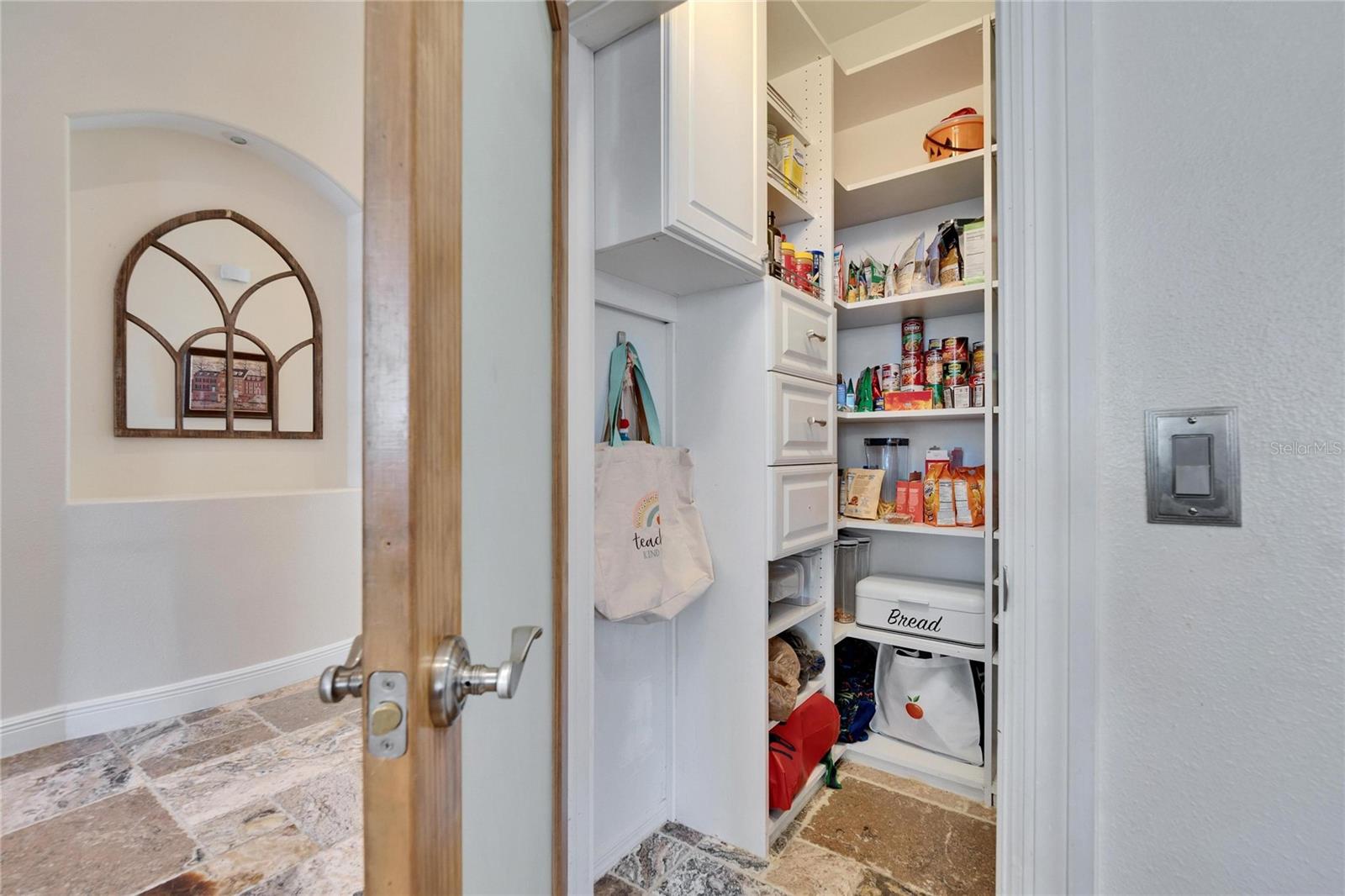 Custom Shelving in Pantry.