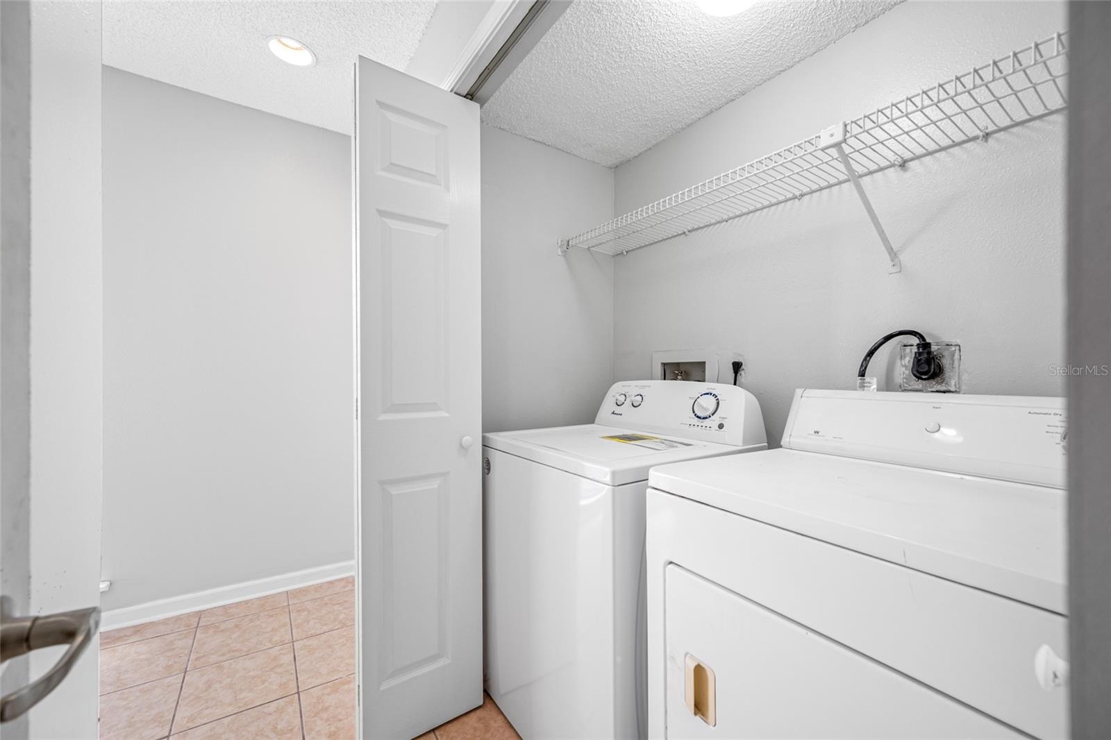 Inside Laundry Area w/ washer/dryer