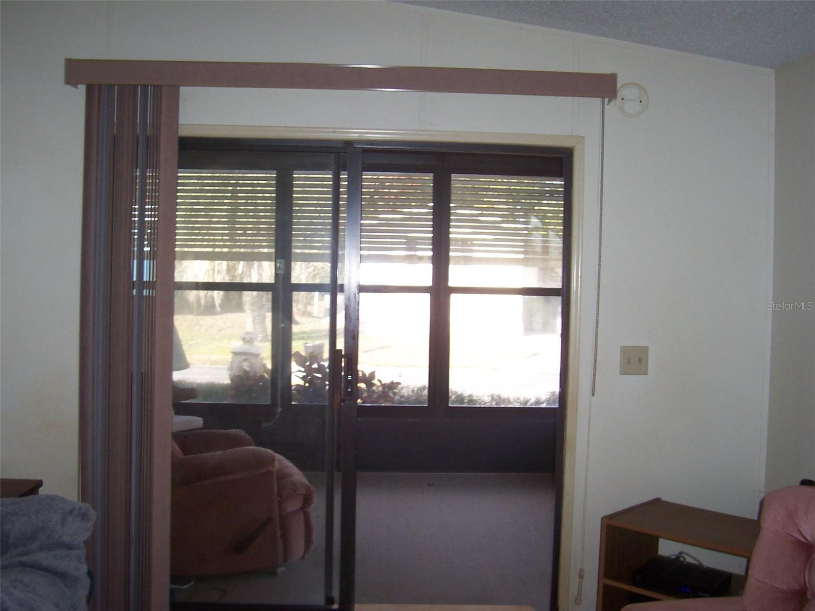 Enter into the home through the sliding glass door from front porch.