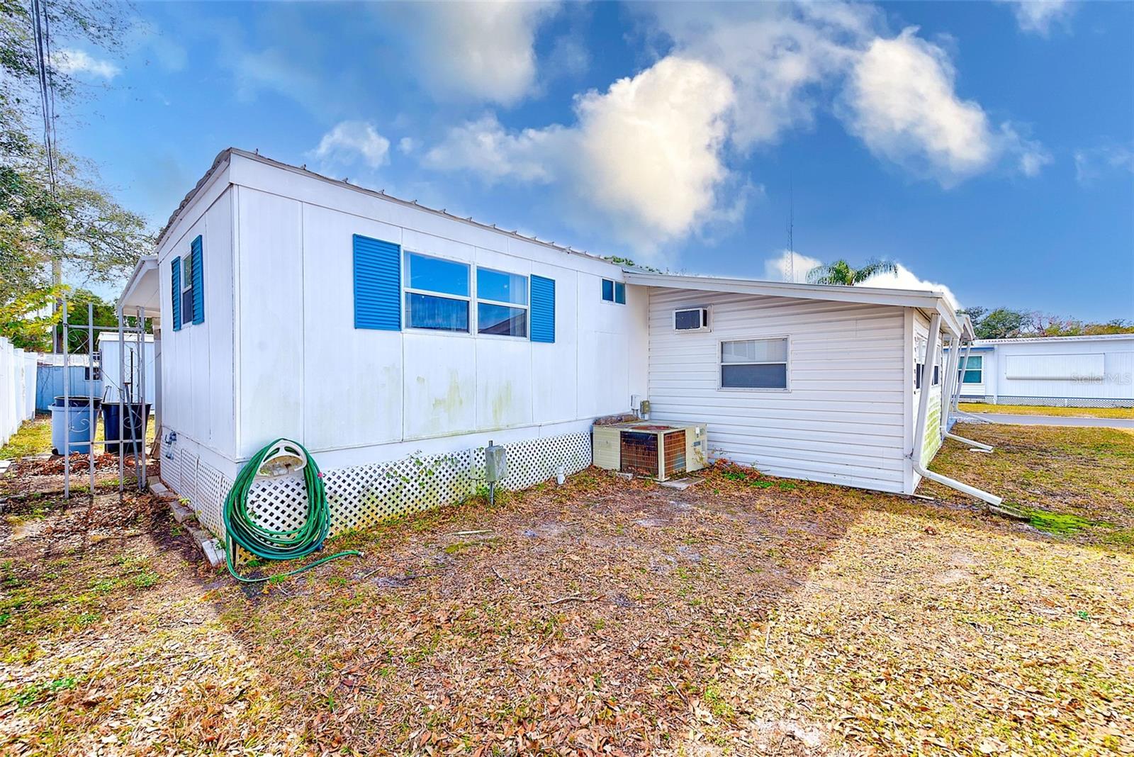 Storage shed with washer and dryer