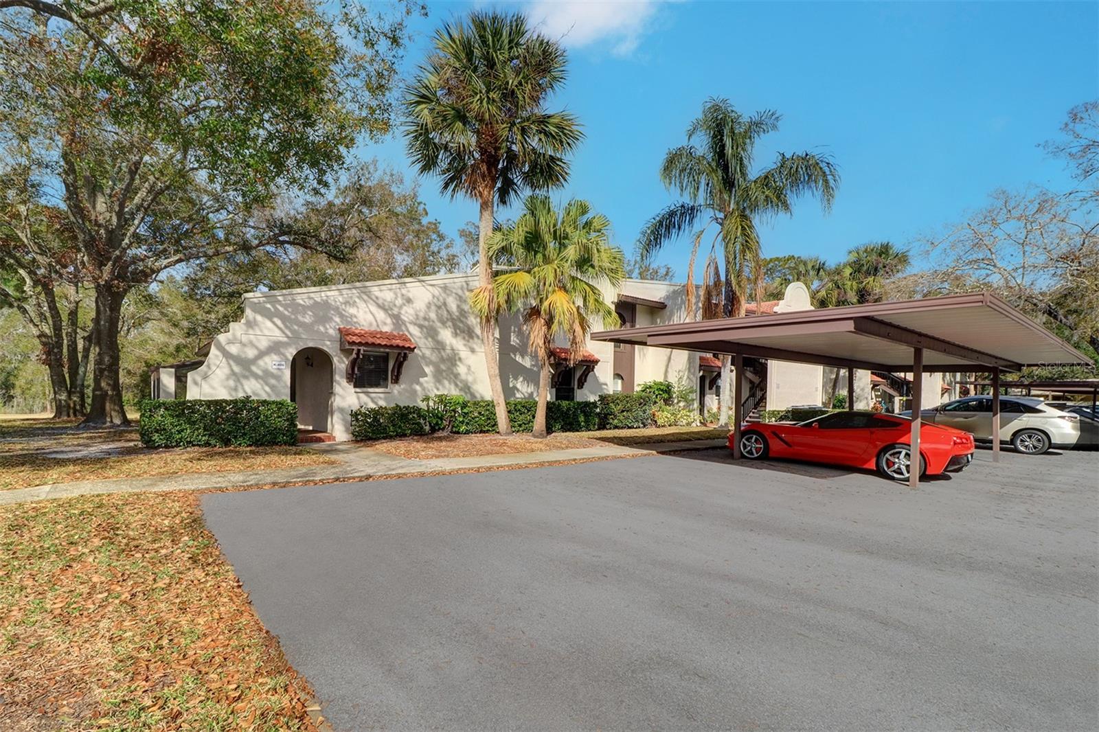 View of the one story villa with location of the assigned carport 406