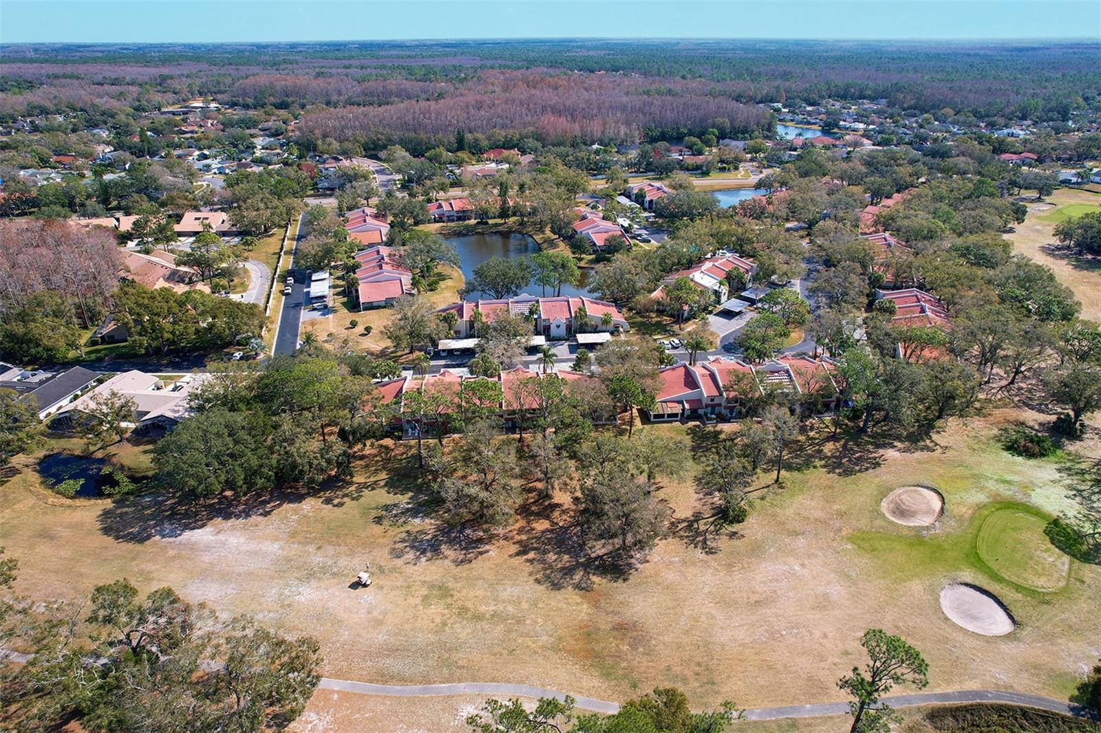 Aerial golf course view back to villa