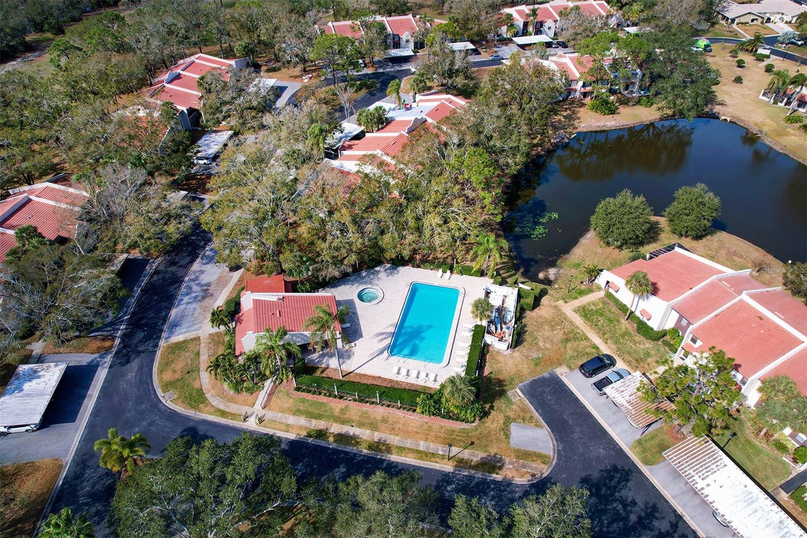 Aerial view of recreational clubhouse facility and pool