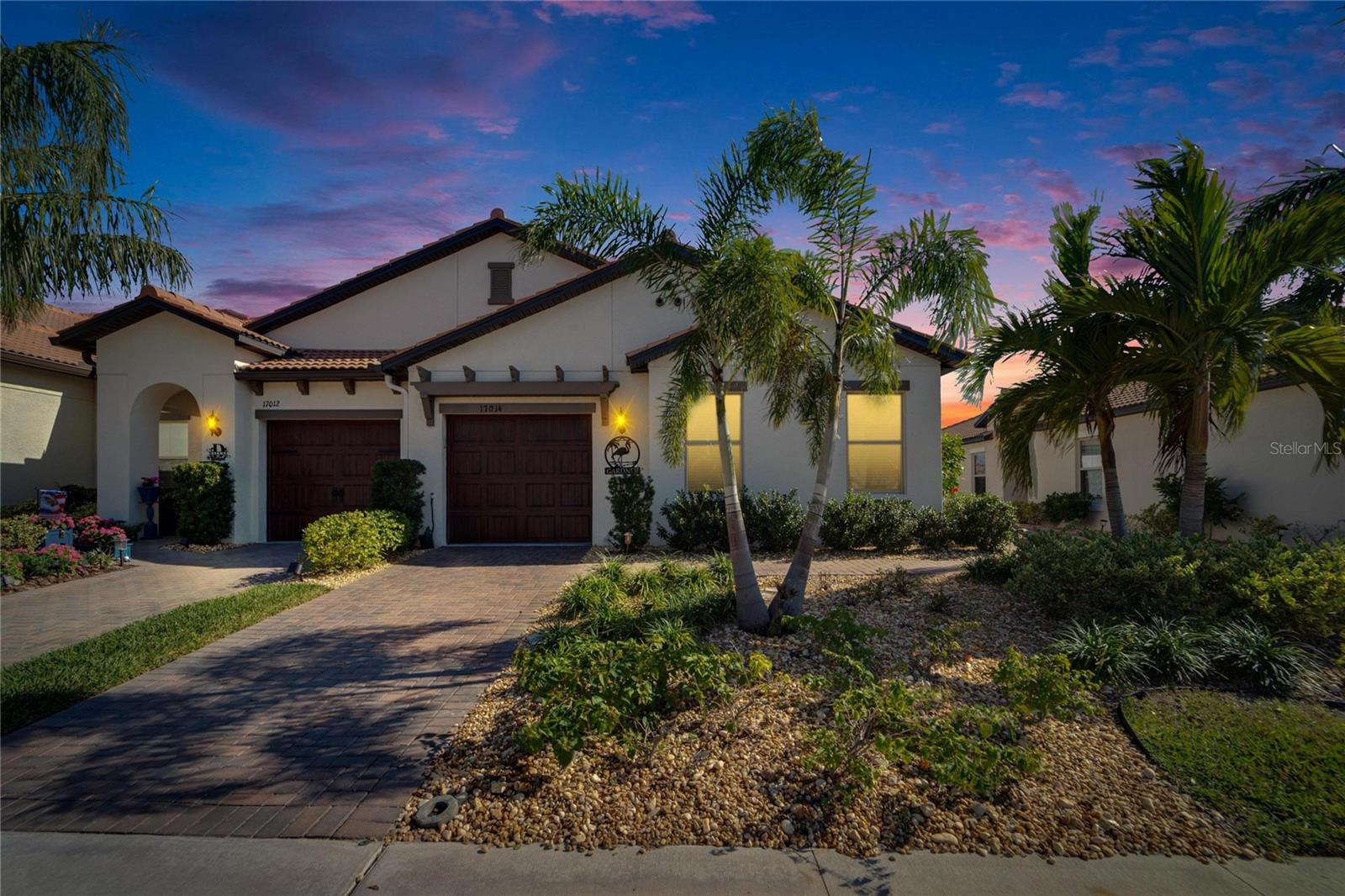 Evening view. Fully landscaped.  Your townhome is the end unit on the right.