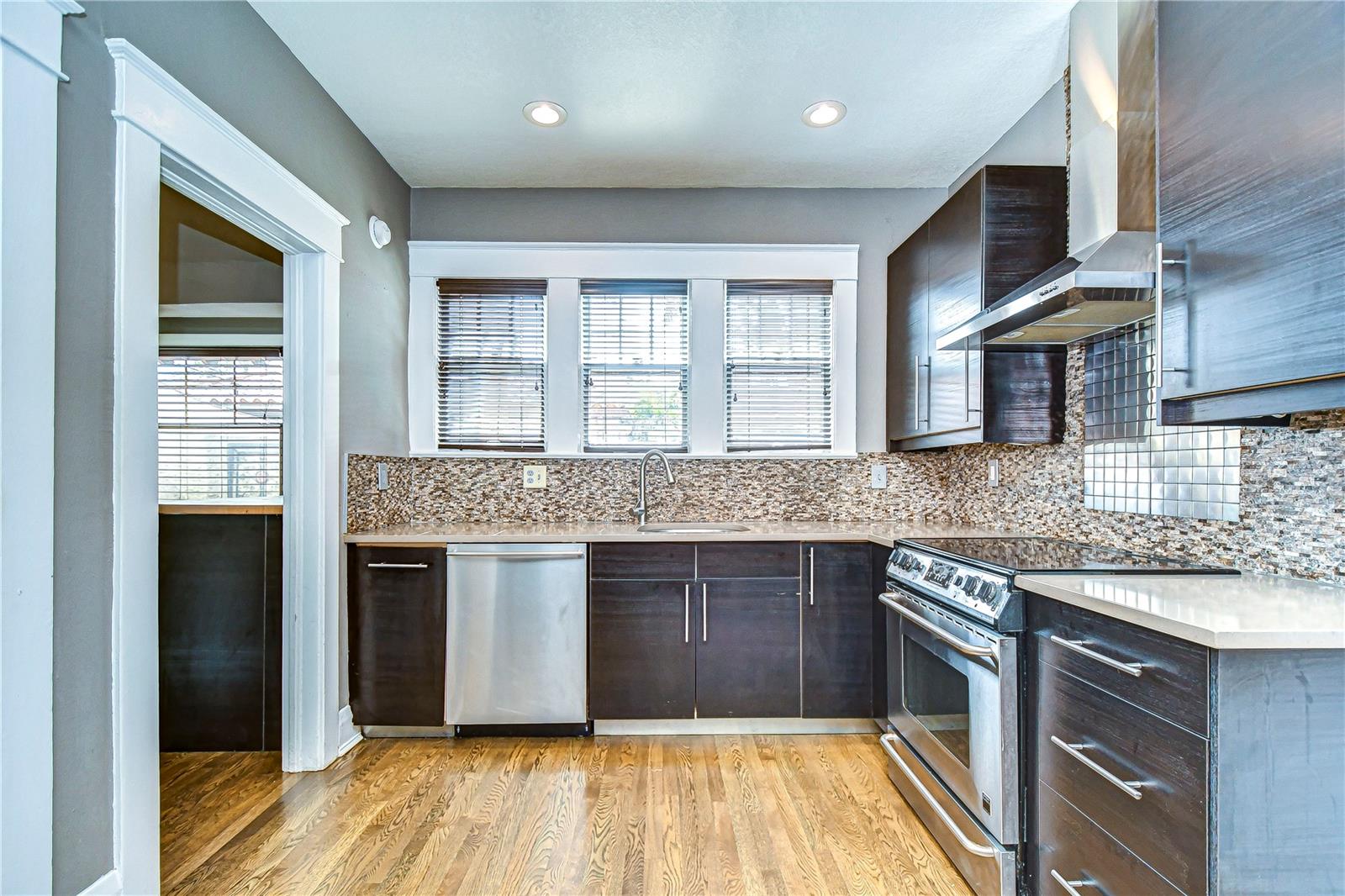 Windows above the sink provide beautiful natural lighting throughout!