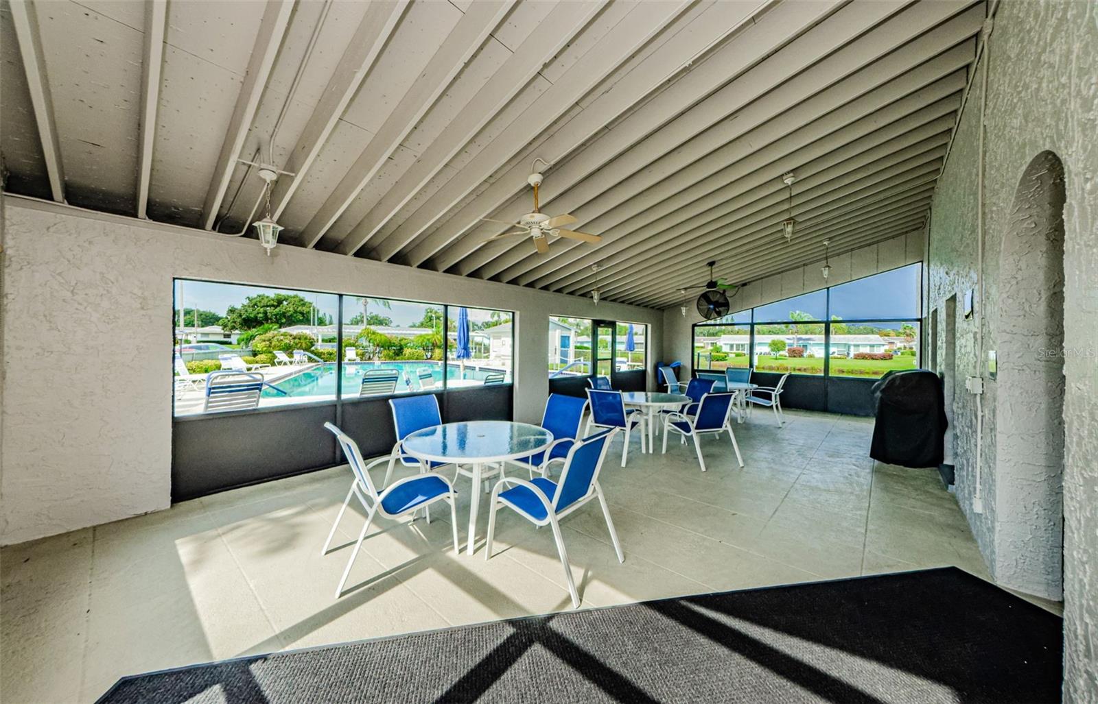 Andover Village Screened Patio - Gather here with friends after a swim!