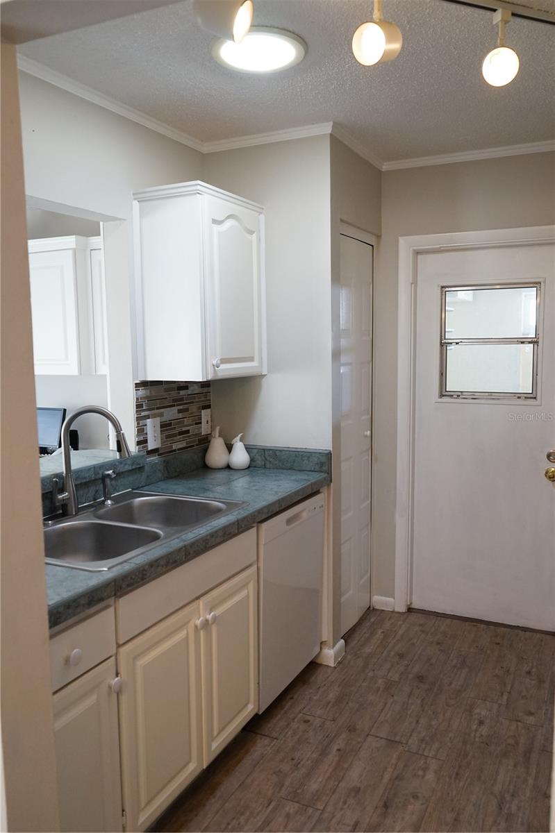 kitchen has door out to garage