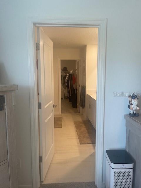 Master bathroom to walk in closet